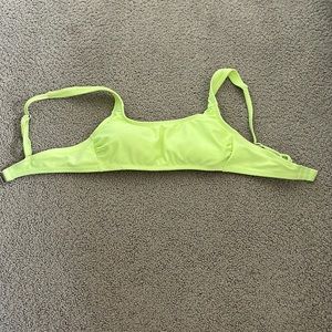 Neon green bikini top.